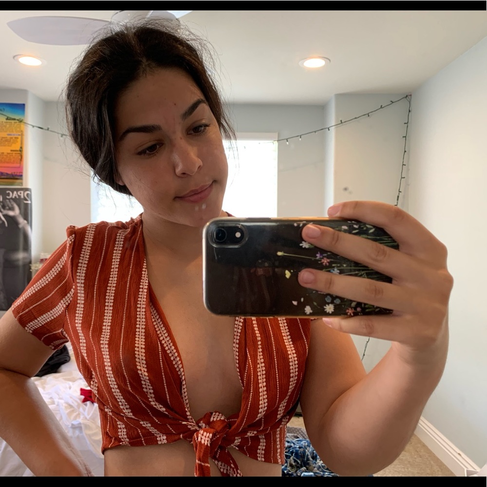 tied crop top ( also worn with a top under )